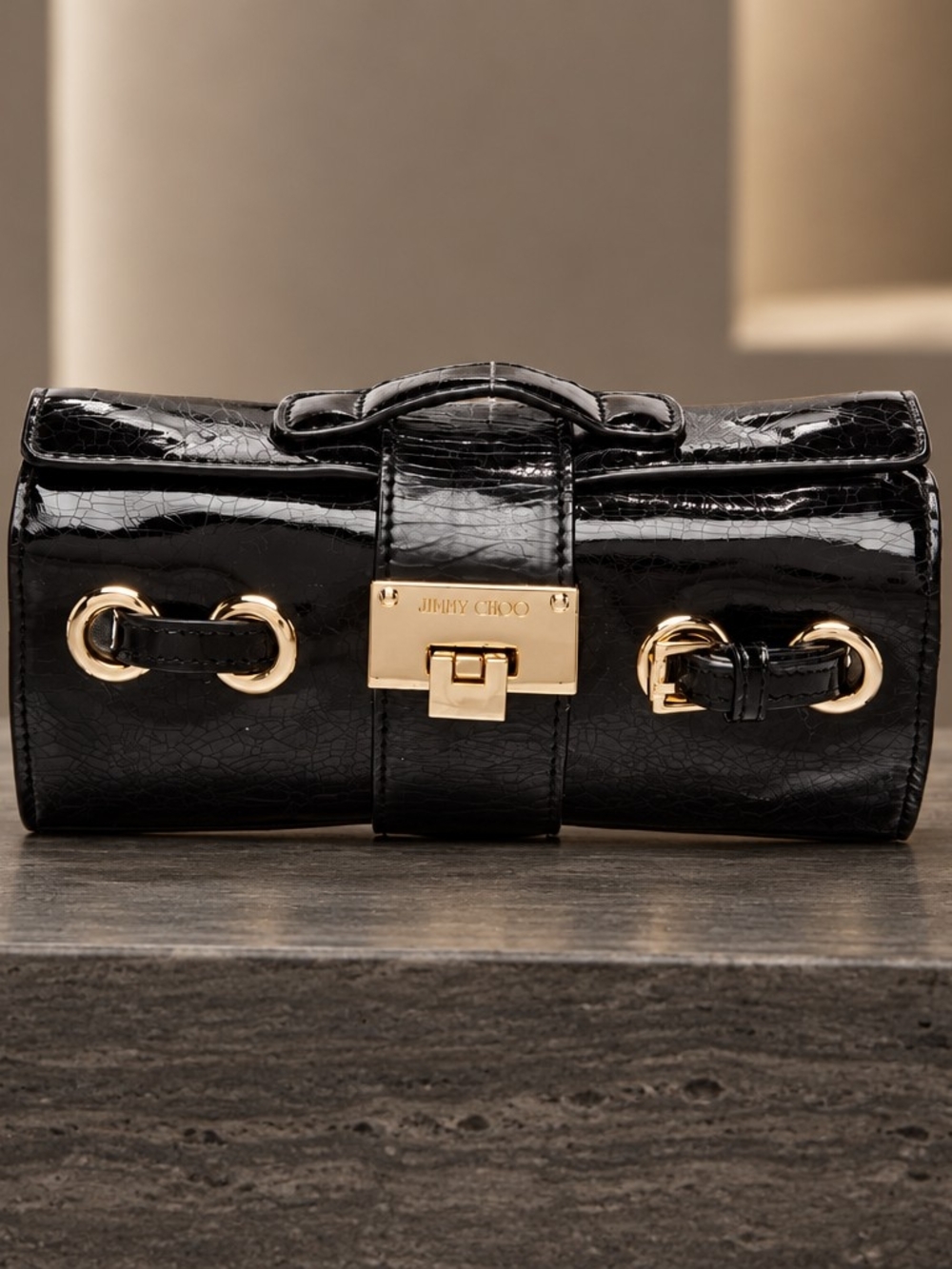 Jimmy Choo Black Patent Roll Clutch with Gold Hardware